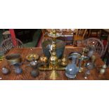 A Middle Eastern brass hookah pipe; a brass oil lamp;