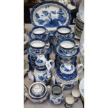 A Booths Real Old Willow pattern matched tea and coffee service, including cups, saucers,