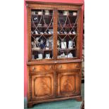 A reproduction mahogany bookcase,