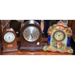 An Edwardian mahogany mantel clock, inlaid, enamel dial, Roman numerals; a ceramic mantel clock,