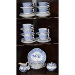 A Spode Geranium pattern six setting part tea service, transfer printed in blue and white,