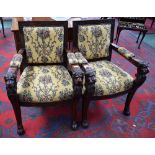 A pair of Empire style mahogany framed library chairs,