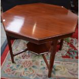An early 20th century mahogany centre table, octagonal top above a conforming undertier,