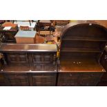 A 20th century oak dresser, arched top with two plate racks,