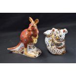 A Royal Crown Derby paperweight, Kangaroo with Joey, gold stopper, boxed; another, Koala and baby,