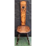 A late 19th/early 20th century poker work spinning chair, decorated with urn of flowers, Carnations,