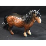 A Beswick model, of a Brown Shetland Pony,