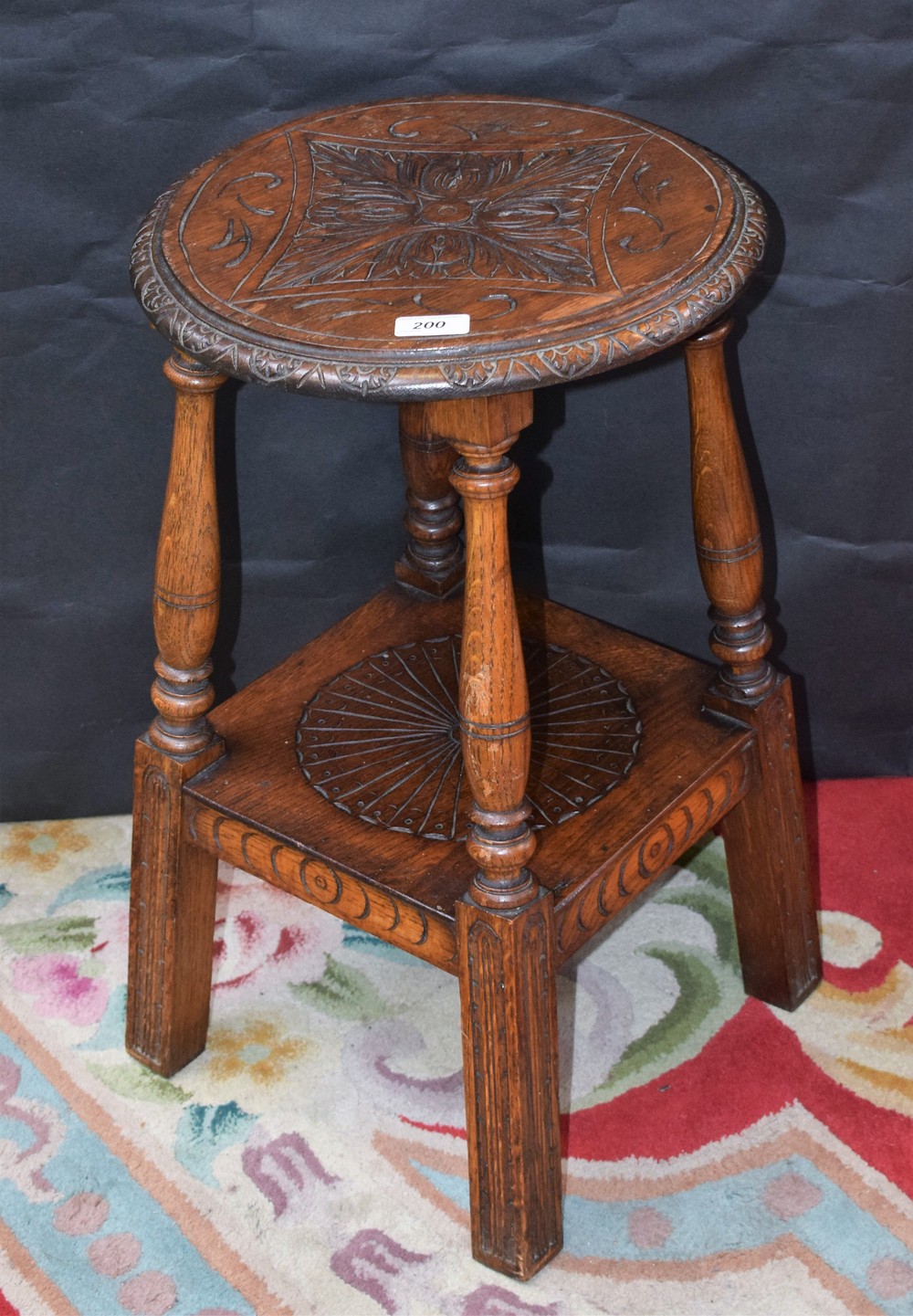 A late 19th/early 20th century oak wine/occasional table,