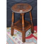 A late 19th/early 20th century oak wine/occasional table,