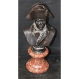 A bronzed metal bust of Napoleon, marked to verso J.E.