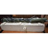 A painted pine ammunition box, rope carry handles, a green canvas camp/cot bed, c.