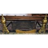 A pair of Louis XIV Revival brass andirons; cast metal fire grate;