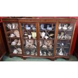 A George III style mahogany breakfront bookcase,
