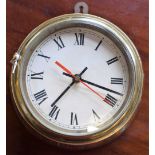 A brass cased ship's clock, 13.