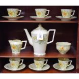 A Crown Staffordshire Daffodils pattern coffee set, for six, comprising coffee pot, cream jug,