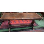 An 18th century oak refectory style, trestle type dining table, rectangular top,