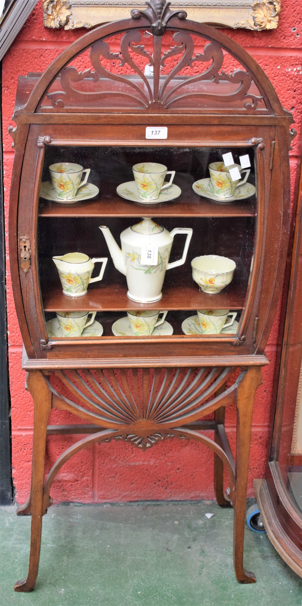 A 20th century mahogany display cabinet,