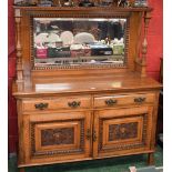 An early 20th century oak sideboard,