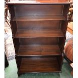 A 20th century mahogany four-tier waterfall bookcase,