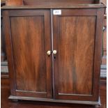 A 20th century mahogany table-top cabinet,