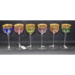 A set of six Moser flashed multicoloured hock glasses with gilt rims