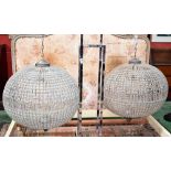 A pair of large contemporary globular wirework and perspex beads ceiling chandeliers,