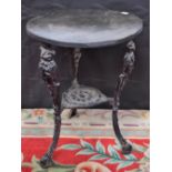 A mid-20th century cast metal 'pub' table, typically cast in the Victorian manner, later top,