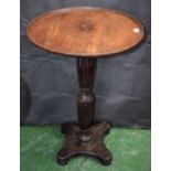 A 19th century mahogany wine/occasional table, dished circular top,