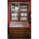 An early 20th century mahogany bureau bookcase,