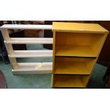 A painted open bookcase;