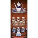 Ceramics - a set of eight Royal Crown Derby Imari coffee cans and saucers;