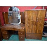 A mid-20th century walnut bedroom suite comprising small wardrobe; dressing table;