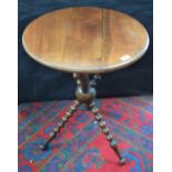 A 20th century mahogany occasional table, moulded circular top,