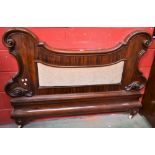 A Victorian mahogany headboard