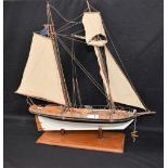 A scratch built model of a two masted sailing ship, Albert, 63cm long overall,