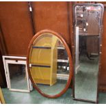 Mirrors - an Edwardian oval mahogany carved panelled framed wall mirror, bevelled plate; another,