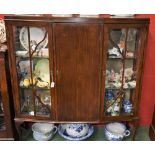 A 20th century oak display cabinet,