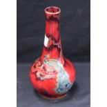 A Bernard Moore flambé slender ovoid vase,