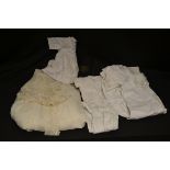 Textiles - a white cotton christening gown; another; similar night dress; a lace wedding dress;