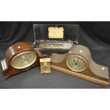 A mid 20th century mahogany Napoleon hat mantle clock; another,