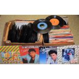 Vinyl Records - a quantity of 7" singles,