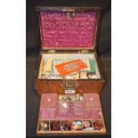 A Victorian walnut and parquetry inlaid lady's sewing box,