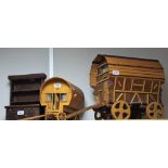 A wooden scratch built model of a Gypsy caravan, 39cm high; another, matchstick model,