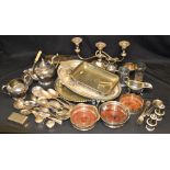 Plated Ware - a three piece silver plated tea set; a candelabrum; trays,