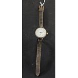 A silver cased Trench wristlet watch