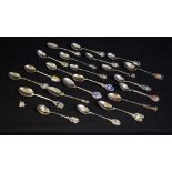 A silver souvenir teaspoon, with enamel shield crest,