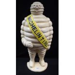 Advertising - a large reproduction cast iron door stop, of The Michelin Tyre Man, standing,