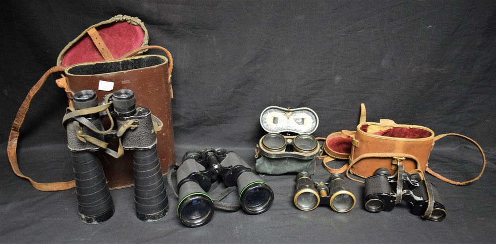 A pair of French sporting binoculars, leather case; a pair of opera glasses; others,