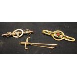 A Victorian 9ct gold seed pearl inset tubular bar brooch, stamped 9ct,