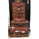 Vintage Luggage - an early 20th century leather suitcase; others, mid 20th century,